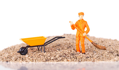 Image showing Miniature worker is cleaning a keyboard