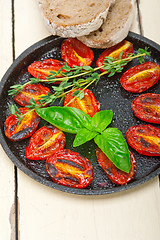 Image showing baked cherry tomatoes with basil and thyme