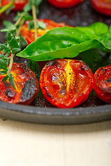 Image showing baked cherry tomatoes with basil and thyme