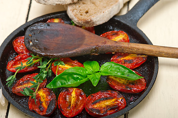 Image showing baked cherry tomatoes with basil and thyme