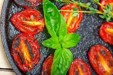 Image showing baked cherry tomatoes with basil and thyme