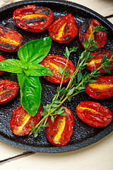 Image showing baked cherry tomatoes with basil and thyme