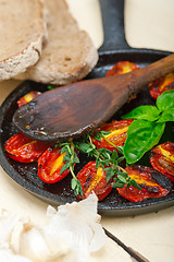 Image showing baked cherry tomatoes with basil and thyme