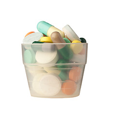 Image showing Cup of pills