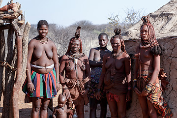 Image showing Himba and zemba woman with ornaments on the neck in the village