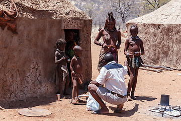 Image showing Himba woman with childs in the village