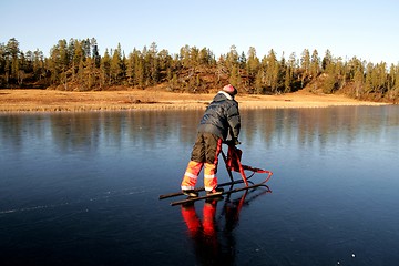 Image showing Man on kick sled