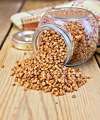 Image showing Buckwheat in glass jar on board