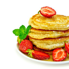 Image showing Flapjacks with strawberries and mint