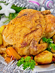 Image showing Chicken with silver Christmas tinsel