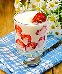 Image showing Yogurt thick with strawberries and daisies on board