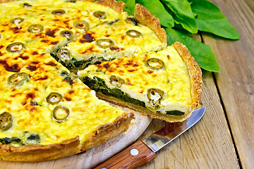 Image showing Pie with spinach and cheese on board