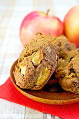 Image showing Cupcake rye with apple on red paper napkin