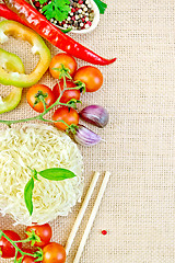 Image showing Noodles rice with vegetables stranded on sacking