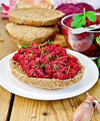 Image showing Sandwich with beet caviar on board