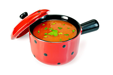 Image showing Soup tomato in red bowl with parsley