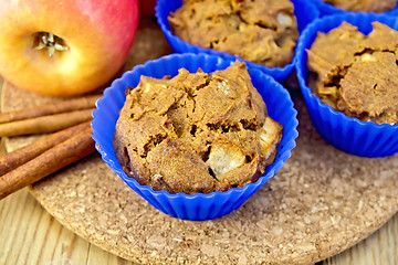 Image showing Cupcake rye with apple in tins on board