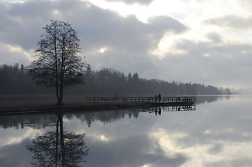Image showing summer landscape, lake and wooden  in fog