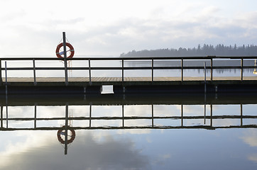 Image showing lake and wooden jetty in fog