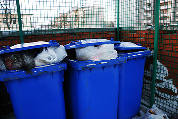 Image showing three blue plastic garbage