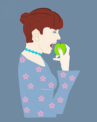 Image showing Woman eating a green apple