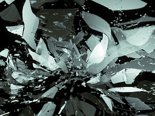 Image showing glass breaking pieces on black shallow DOF