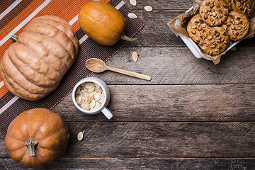 Image showing pumpkins and cookies with nuts in Rustic style 