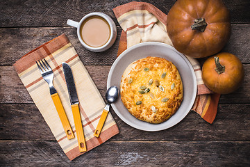 Image showing Morning coffee with flatbread and pumpkins in rustic style