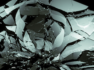 Image showing Destructed or Shattered glass pieces on black shallow DOF