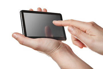 Image showing tablet pc with touch screen in hands isolated