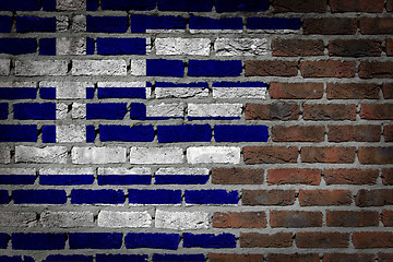 Image showing Brick wall texture with flag