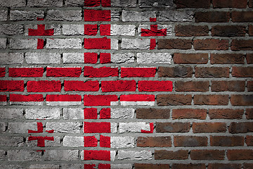 Image showing Brick wall texture with flag