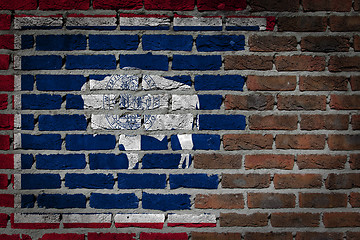 Image showing Brick wall texture with flag