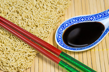 Image showing raw chinese noodles with soy sauce