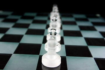 Image showing Chess Pieces on a glass board - Pawnage