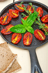 Image showing baked cherry tomatoes with basil and thyme