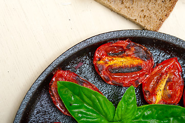 Image showing baked cherry tomatoes with basil and thyme