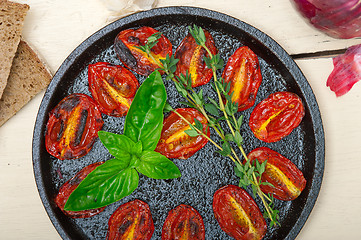 Image showing baked cherry tomatoes with basil and thyme