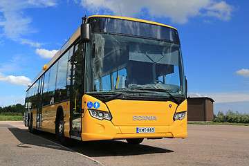 Image showing Yellow Scania Citywide Bus at Bus Stop