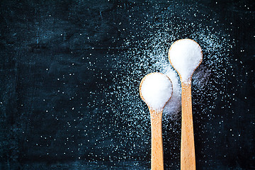 Image showing sugar in wooden spoons