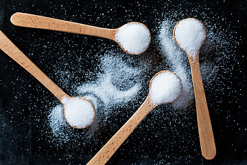 Image showing sugar in wooden spoons 