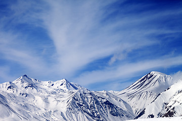 Image showing Winter snowy mountains in windy day