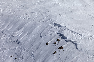 Image showing Off-piste slope with snow cornice and stones