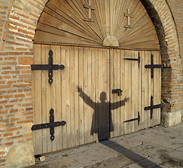 Image showing shadow on the gate