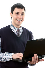 Image showing Smiling man with laptop