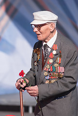 Image showing Old veteran of World War II near tribunes