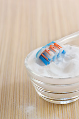 Image showing sodium bicarbonate  and a toothbrush