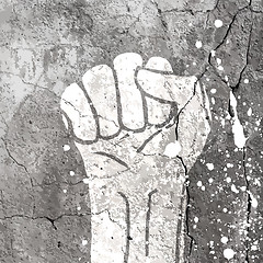 Image showing Grunge fist illustration on concrete texture with white splashes