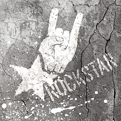 Image showing Rockstar symbol with sign of the horns gesture. Vector template 