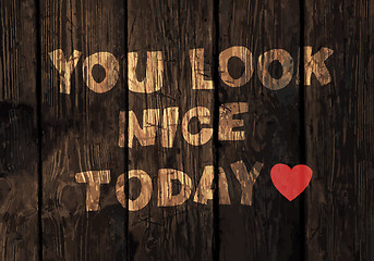 Image showing Motivational Phrase On Wooden Planks Texture. Vector